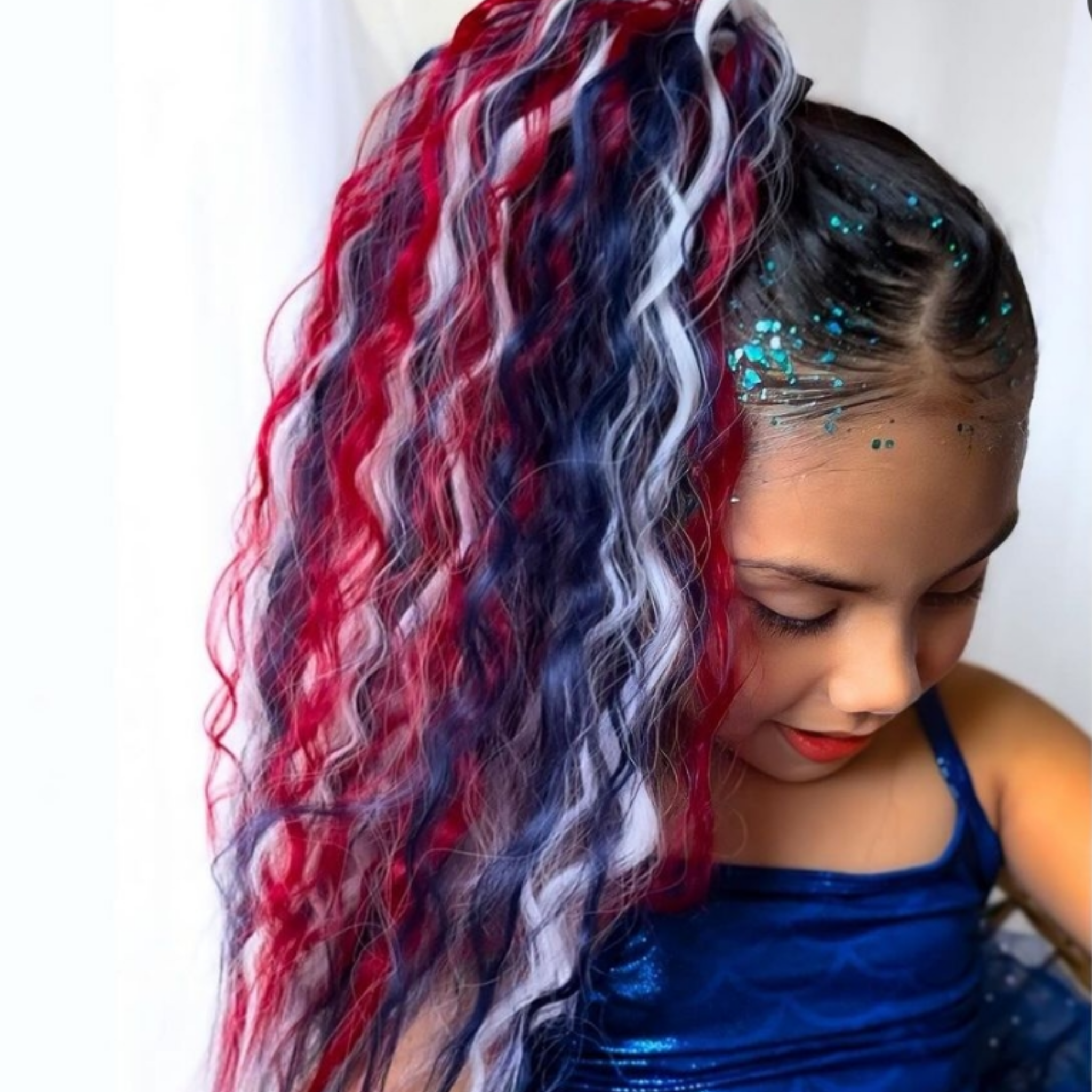 The original premium reusable kids multi-colored sports carnival hair extensions with tinsel by Mermaid Hair By Emma, perfect for school sports days, field days and crazy hair day hairstyles.