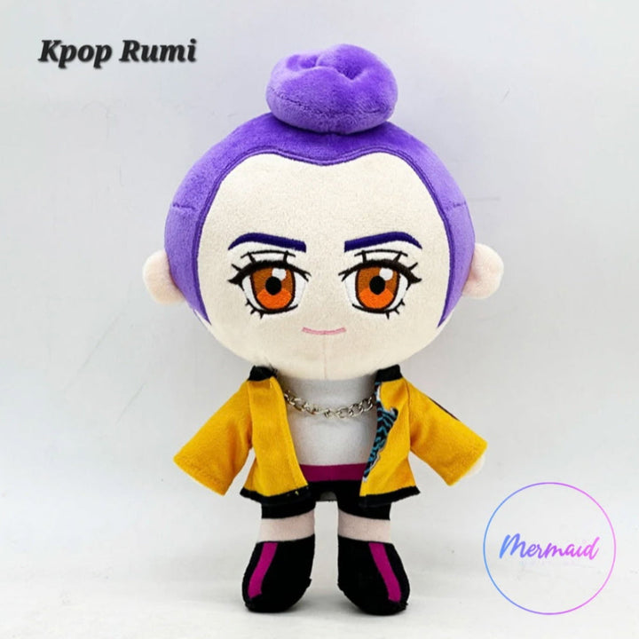 Plush toy with purple hair and yellow jacket on a white background, branded 'Kpop Rumi'.