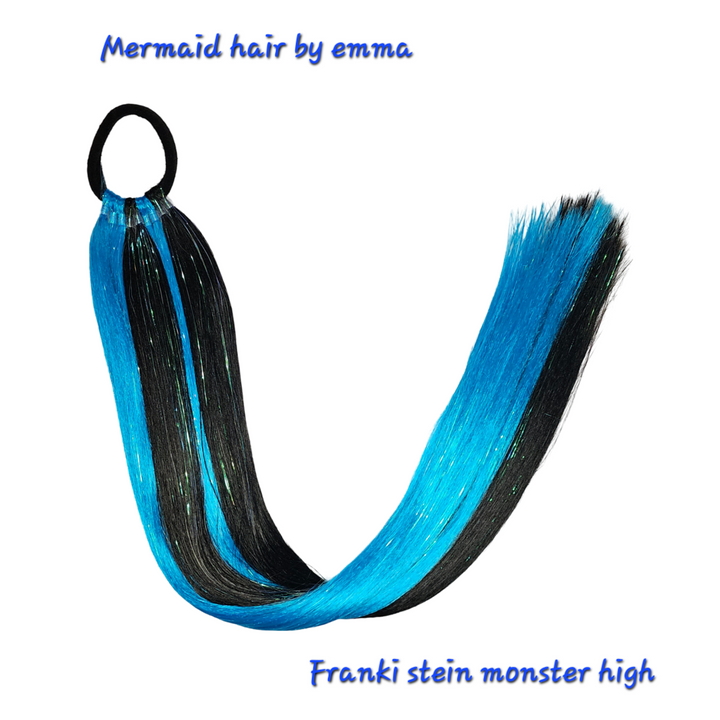 A set of mermaid hair extensions with blue and black strands, displayed against a white background with a label stating 'Franki Stein Monster High'.